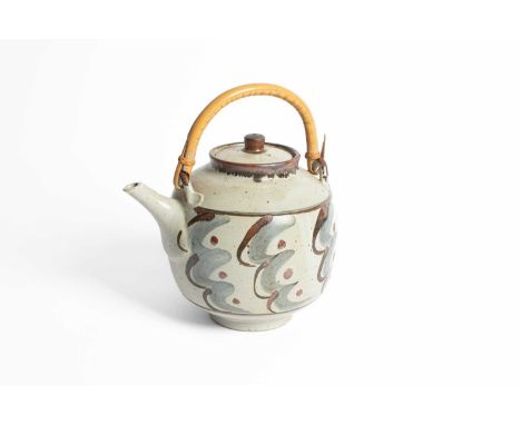 ARR David Leach (1911-2005) for Lowerdown Pottery a stoneware lidded teapot decorated cream glaze with iron speckle, an iron 