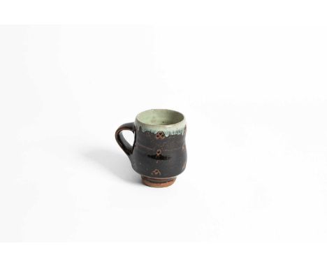 ARR Phil Rogers (1951-2020) an iron glazed mug decorated repeating design, impressed PR seal, 10cm highIn good condition - no