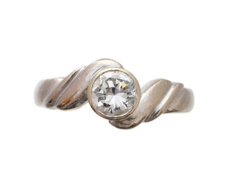 An 18ct gold diamond single-stone ring, the brilliant-cut diamond collet with crossover shoulders, estimated diamond weight 0