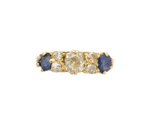 An early 20th century sapphire and diamond dress ring, the old cut diamond and circular shape sapphire line with old cut diam