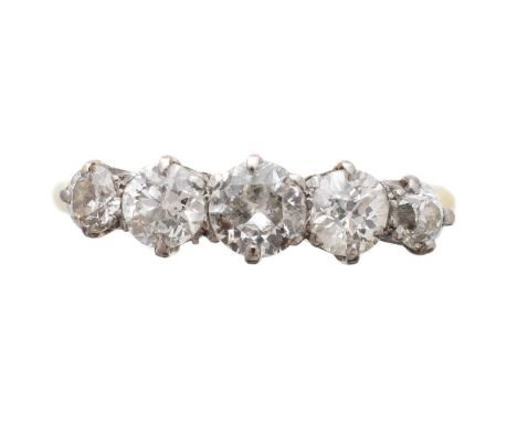 A diamond five-stone ring, the old-cut diamond line with shared claw settings and tapered shoulders, estimated total diamond 