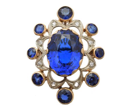 A synthetic spinel, sapphire and diamond brooch, the oval shape synthetic spinel within a rose-cut diamond and circular shape