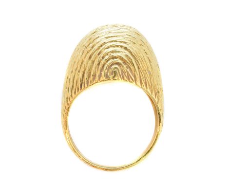 A 1970s bombé ring, with textured finish, stamped 750, ring size L1/2, gross weight 7.4g.Condition report: Overall condition 