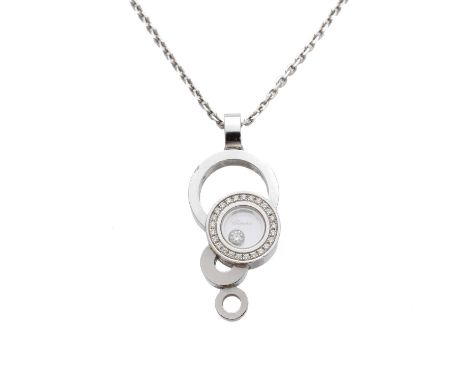 An 18ct gold diamond 'Happy Bubbles' pendant, by Chopard, of asymmetric design, the circular glazed panel containing a floati