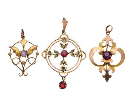 Three early 20th century gem-set pendants, to include an amethyst Art Nouveau pendant, together with a purple paste pendant a