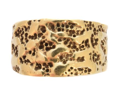 A band ring, the textured band with tapered sides, stamped 14K, ring size P1/2, gross weight 8.1g.