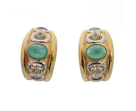 A pair of emerald and diamond earrings, each designed as an oval emerald cabochon within a bi-colour convex hoop with single-