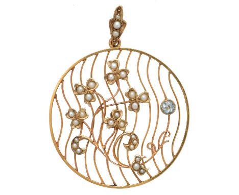 An early 20th century aquamarine and split pearl pendant, the circular shape aquamarine and split pearl foliate detailing wit