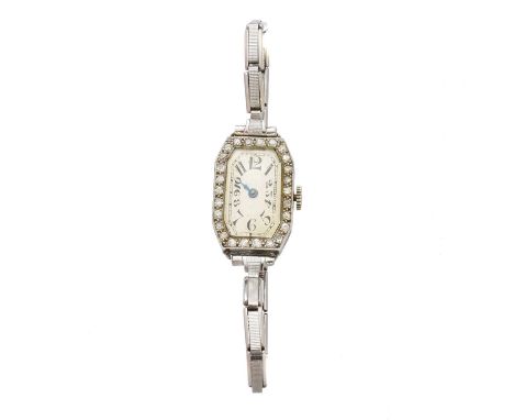 An Art Deco diamond cocktail watch, the rectangular shape cream dial with Arabic hour markers, 17 jewel movement, within a va