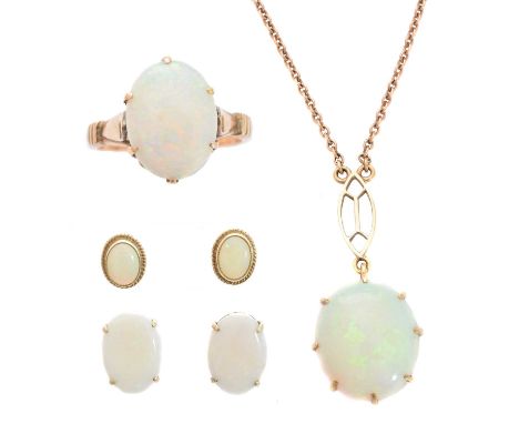 A selection of opal jewellery, to include an opal single stone pendant, an opal single stone ring and two pairs of opal stud 