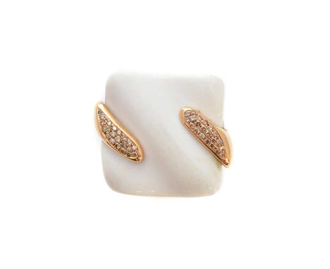 An 18ct gold ceramic and diamond ring by Gavello, the cushion shape white ceramic panel with pavé set diamond claws, estimate