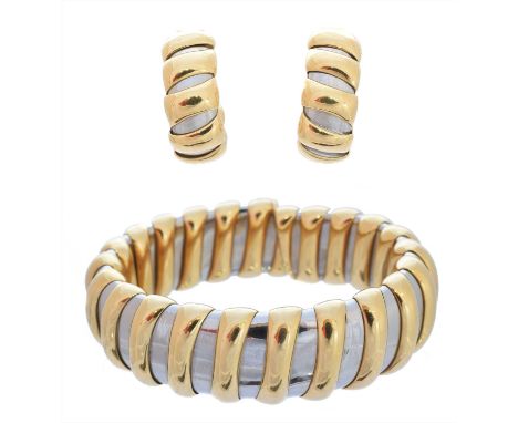 A suite of 18ct gold and stainless steel jewellery by Bulgari, comprising a bangle and earrings of bi-colour polished design,