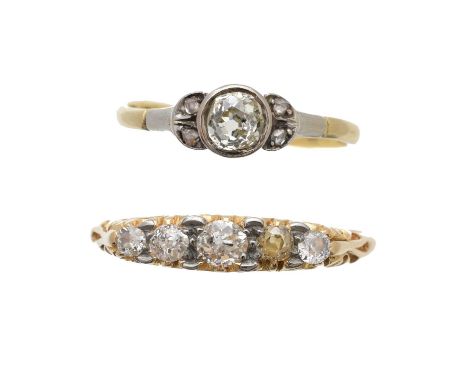 Two early 20th century diamond dress rings, to include a diamond five-stone ring, together with a diamond solitaire ring, est