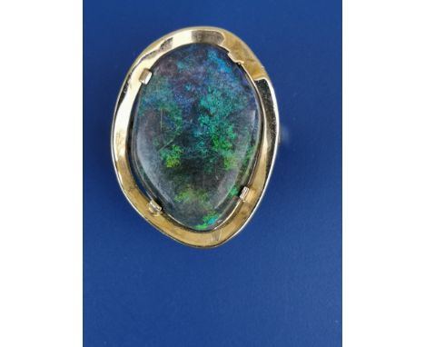 A black opal 18ct gold ring to match the previous lot, the opal 21 x 14mm.  Finger size K/L.