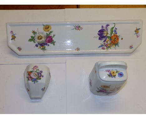 A Limoges porcelain bathroom shelf printed in coloured flowers on white, 23.5" across, together with a toothbrush holder and 