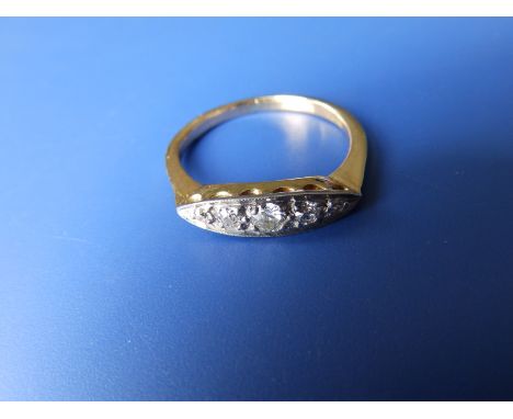 A graduated old cut five stone diamond ring on yellow metal shank with 'PLAT' setting, total diamond weight approximately 0.3