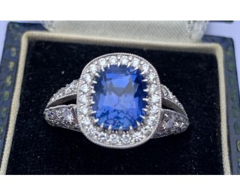 A certified natural colour change 3.52 carat Sri-Lankan sapphire &amp; diamond cluster ring, the rectangular cushion cut sapp