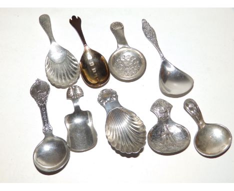 A Chester silver caddy spoon - AM, 1916, three modern silver caddy spoons and five other plated/silver caddy spoons.  (9)