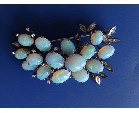 An opal &amp; diamond leaf spray brooch in white metal,  2.2".