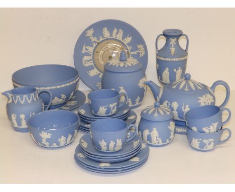 A 9" Wedgwood blue jasper pedestal vase - 1956, a 9.4" diameter wall barometer and 22 pieces of blue jasper tableware. (24)