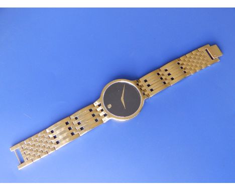 A gent's gilt stainless steel Movado  'Museum' wrist watch with quartz movement, in box with some spare links - box a/f.