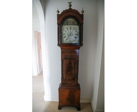 An early 19thC mahogany eight day striking longcase clock by Morse of Lyneham, three gilt ball finials above  the painted dia