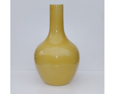 An 18thC Chinese Imperial yellow glazed porcelain bottle vase, 15.5" high - base drilled for use as lamp. From a Private Esta