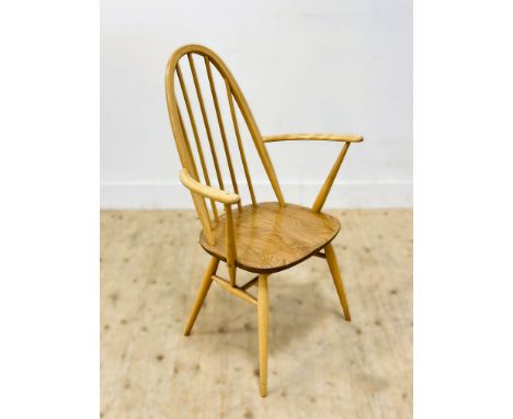 An Ercol light ash and elm hoop back open armchair (h. 97cm)