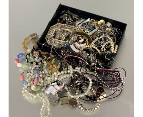 A collection of costume jewellery to include; paste pearl necklace, a hardstone oval bead necklace, bangles, paste pearl ring