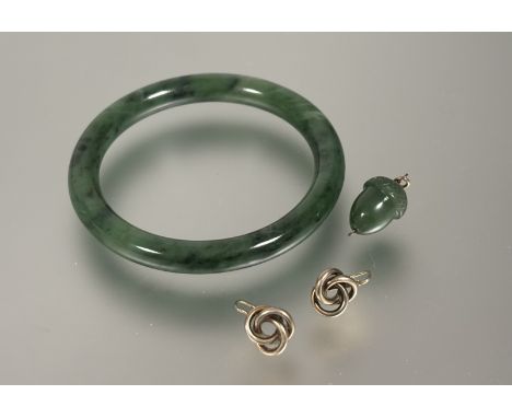 A modern dark green jadite bangle: d. x 6cm, a green stone accorn pendant: l. x 2cm and a pair of 9ct gold knot drop earrings