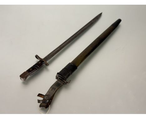 1913 Remington pattern bayonet, overstamped marks, in original scabbard and frog