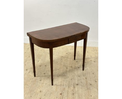 A 19thc mahogany inlaid demi lune foldover card table with baize to interior (losses) (h.64cm x l.92cm x closed: w.45cm)