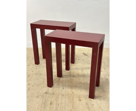 A pair of red lacquered console tables (h. 80cm x l. 72cm x w.37cm)