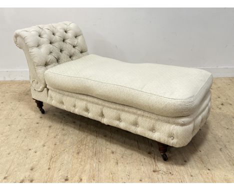 A Victorian walnut framed adjustable scroll button back boudoir day bed with feather pad upholstered in off white lined daisy