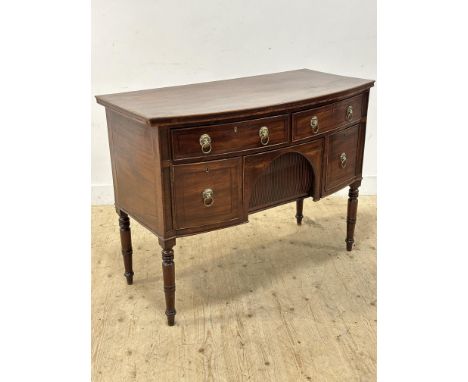 A 19thc mahogany bow front assistant sideboard, fitted an arrangement of two short drawers over lone drawer to one side and c