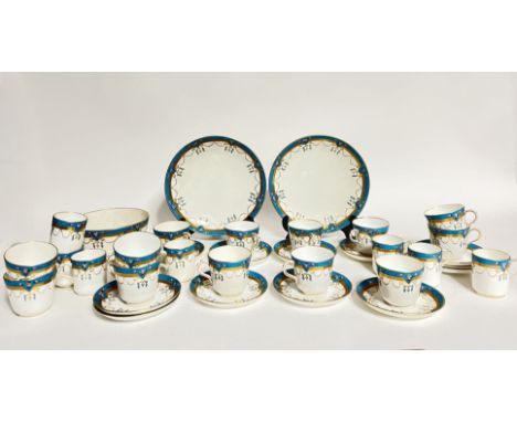 A Mintons blue and white tea service with floral detailing comprising of two service plates/salad plates (d. 23cm), thirteen 