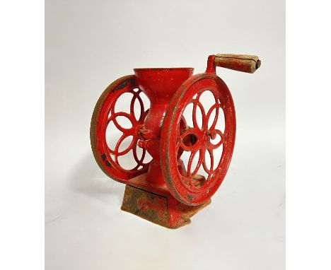 An Enterprise MFG Co Philadelphia cast iron counter-top coffee grinder enamelled red with wooden handle (a/f - missing lid) (