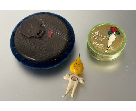 A Columbia Records circular record dust cleaner with dark blue duster verso, a 1960's Esso Oil Drop charm figure together wit