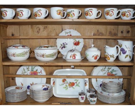 A Royal Worcester Evesham pattern Oven to Table Ware dinner and tea service, for eight, comprising tureens, butter dish, jugs