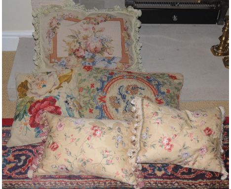 A pair of silk cushions, in yellow;  others, tapestry 