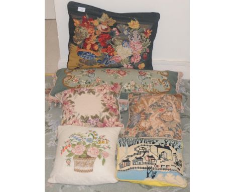 A woolwork tapestry cushion, embroidered with flowers;  others (4) 