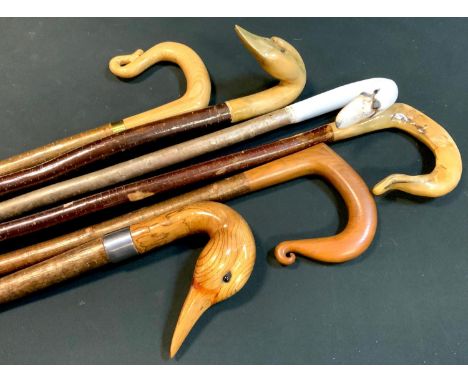 Walking Sticks - A carved Ducks Head handled walking stick;  others Shepherds crook, etc, tallest 140cm (6) 