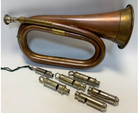 An early 20th century Metropolitan Policeman's whistle, others, similar; copper and brass bugle, qty 