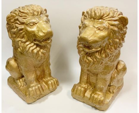 Architectural salvage - a pair of reconstituted stone garden lions, modelled seated, 39cm high (2) 