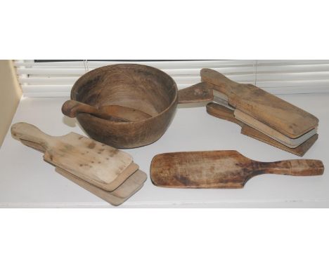 An 18th century sycamore bowl, with handle, 19.5cm diam;  a ladle;  various butter pats 