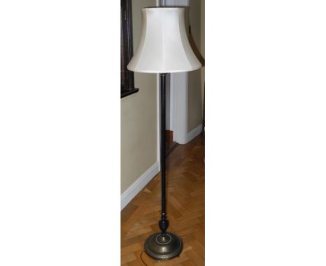 A brass and cast iron standard lamp, the base cast Calpa 268 