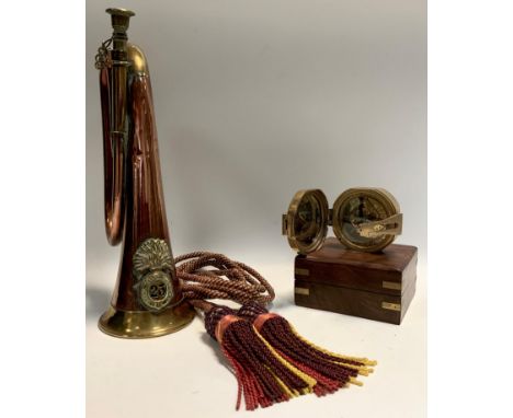 A Royal Welsh Fusiliers regimental bugle, copper and brass tubular body, cast regimental badge, No 23, a reproduction ships p