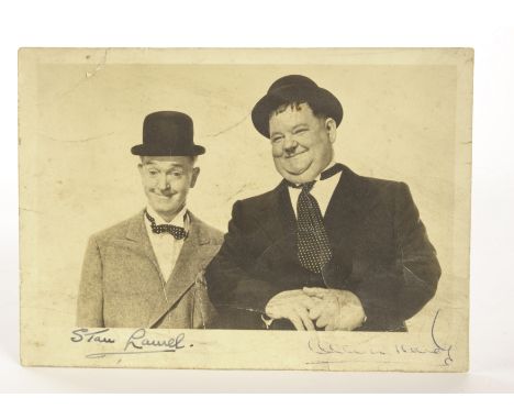 Laurel And Hardy Autograph: vintage photograph signed by Stan Laurel and Oliver Hardy, signature acquired by vendor’s brother