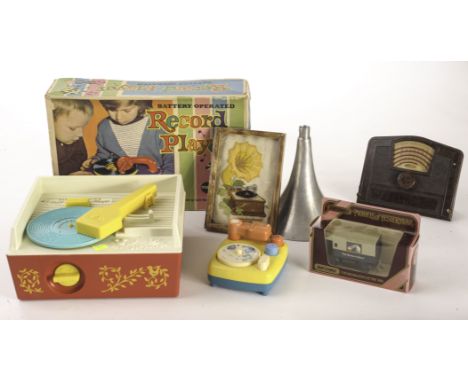 Toy gramophones and others: a Marx plastic toy gramophone in maker’s box; a Fisher-Price ‘Music Box Record Player’ with five 