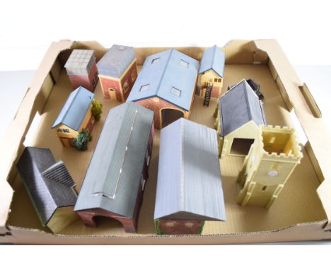 Group of resin and plastic models of buildings to include engine shed, water tower, church etc
